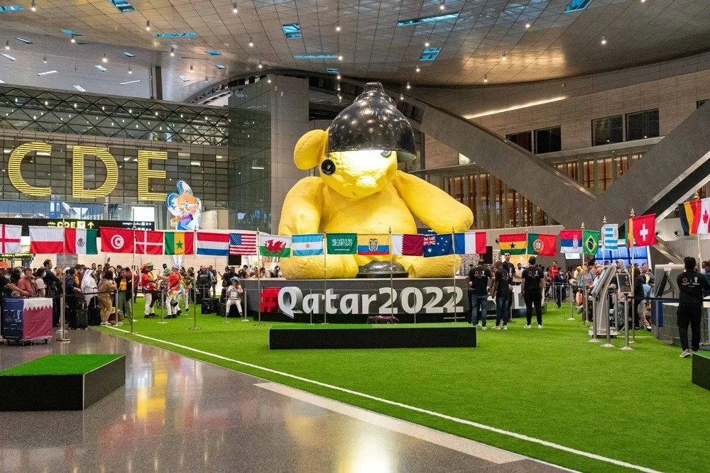 Larger-than-life mascot installation at the airport, Qatar 2022